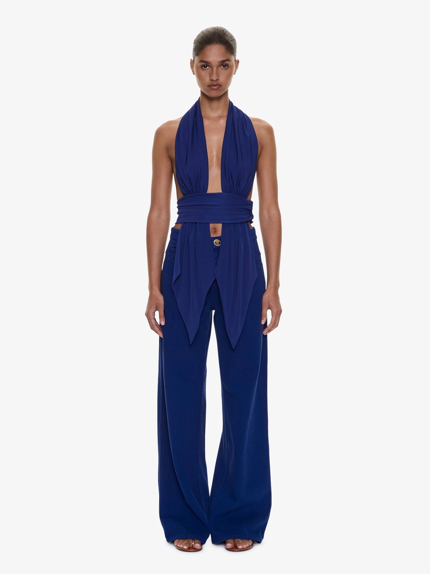 Image of a model wearing Pants. Product name - Relaxed Denim Quartz Jean in Ink colour by brand - CHRISTOPHER ESBER