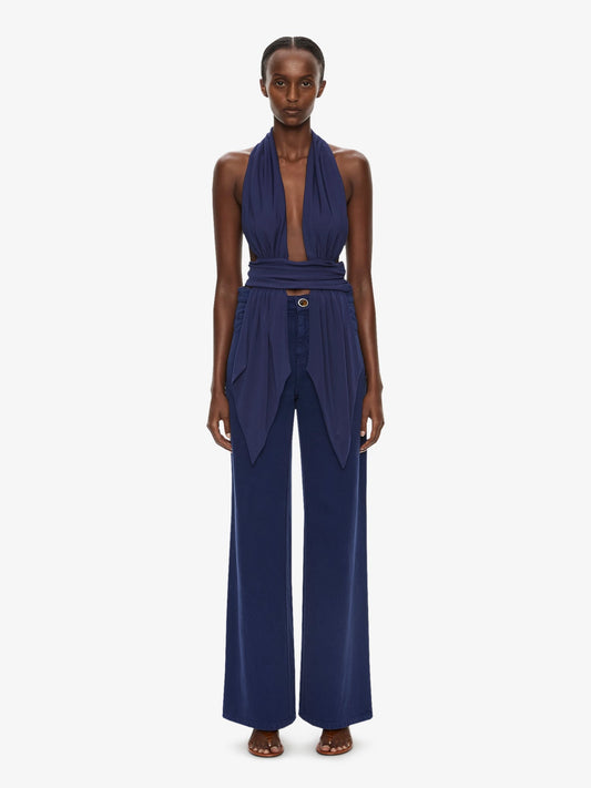Image of a model wearing Pants. Product name - Relaxed Denim Quartz Jean in Ink colour by brand - CHRISTOPHER ESBER