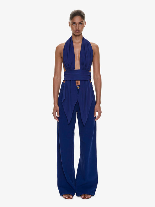 Image of a model wearing Pants. Product name - Relaxed Denim Quartz Jean in Ink colour by brand - CHRISTOPHER ESBER
