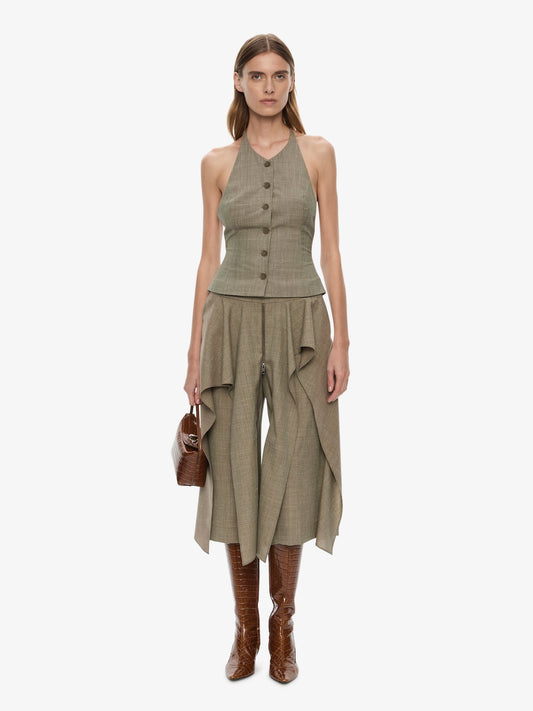 Image of a model wearing Pants. Product name - Tropical Wool Split Trouser Skirt in Marle colour by brand - CHRISTOPHER ESBER