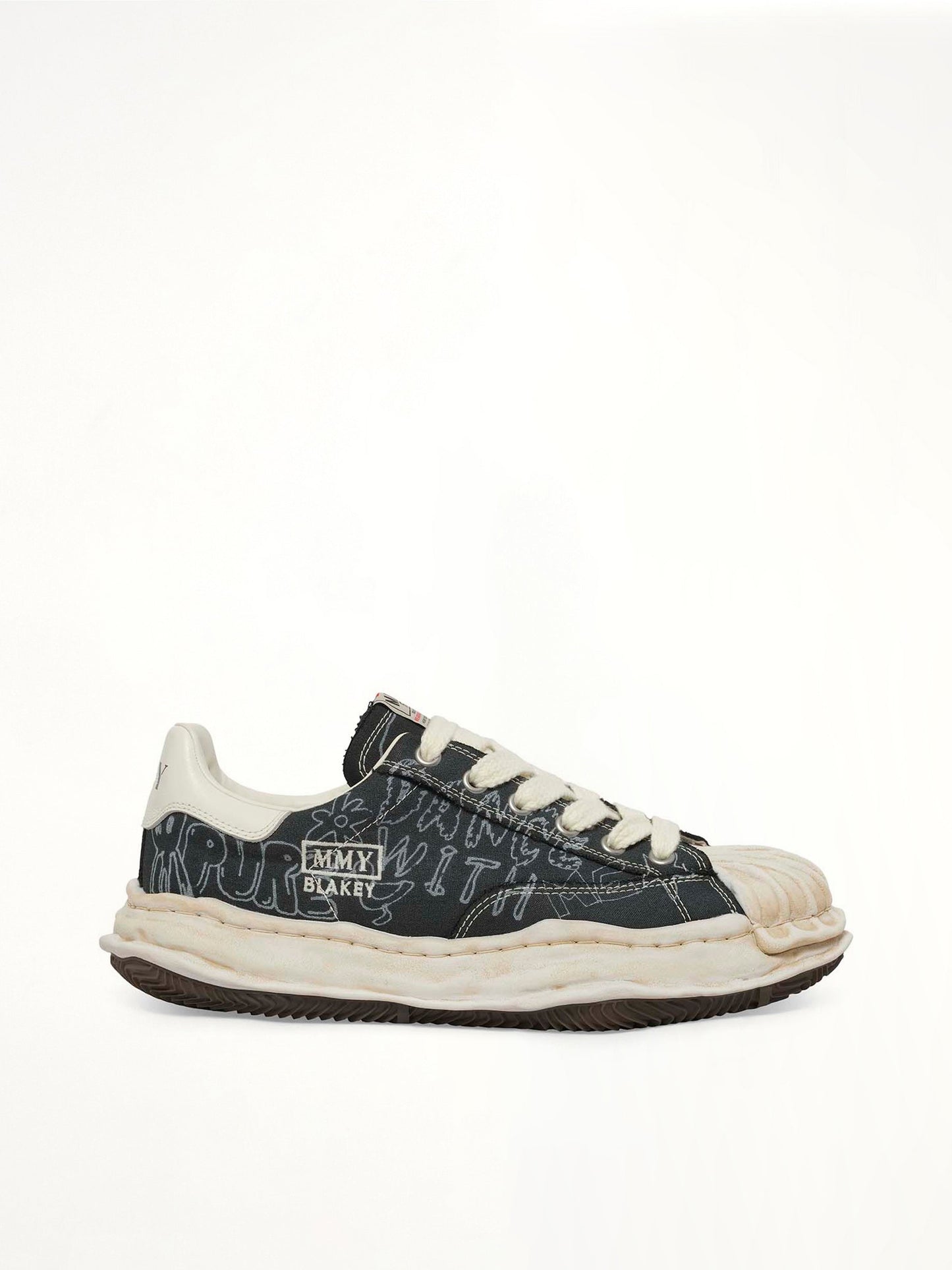 Image of Sneakers. Product name - Blakey OG Graffiti Printed Sneaker in Black colour by brand - MAISON MIHARA YASUHIRO