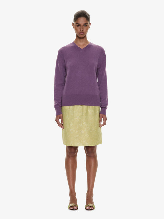 Image of a model wearing Skirts. Product name - Light Leak Jacquard Slip Skirt in Chartreuse colour by brand - CHRISTOPHER ESBER