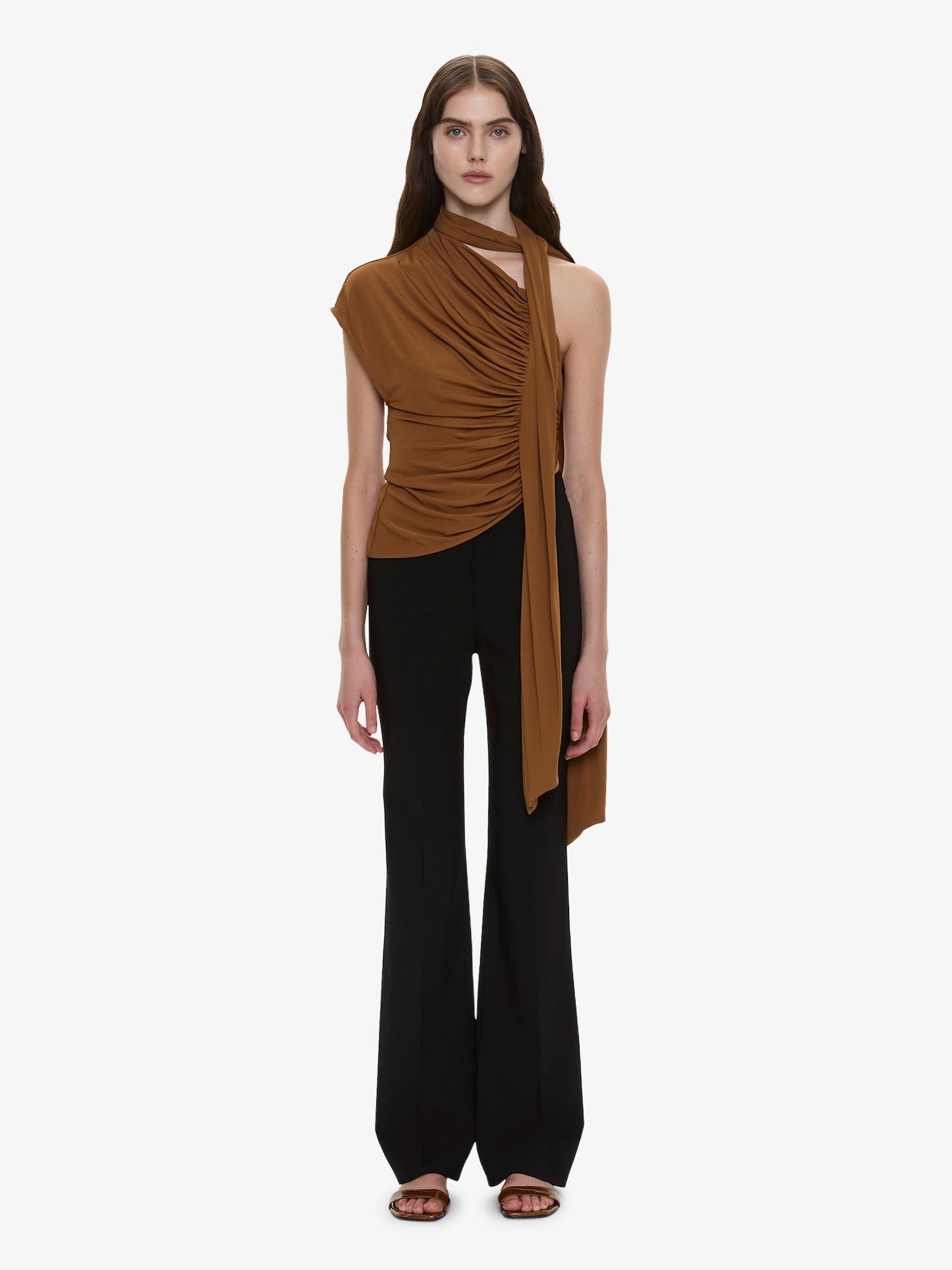Image of a model wearing Pants. Product name - Saman Tailored Trouser in Black colour by brand - CHRISTOPHER ESBER