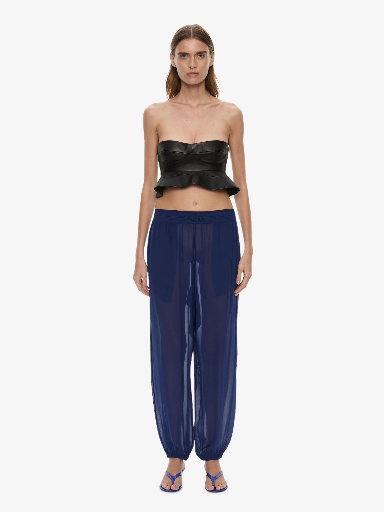 Image of a model wearing Pants. Product name - Bennett Silk Pant in Ink colour by brand - CHRISTOPHER ESBER