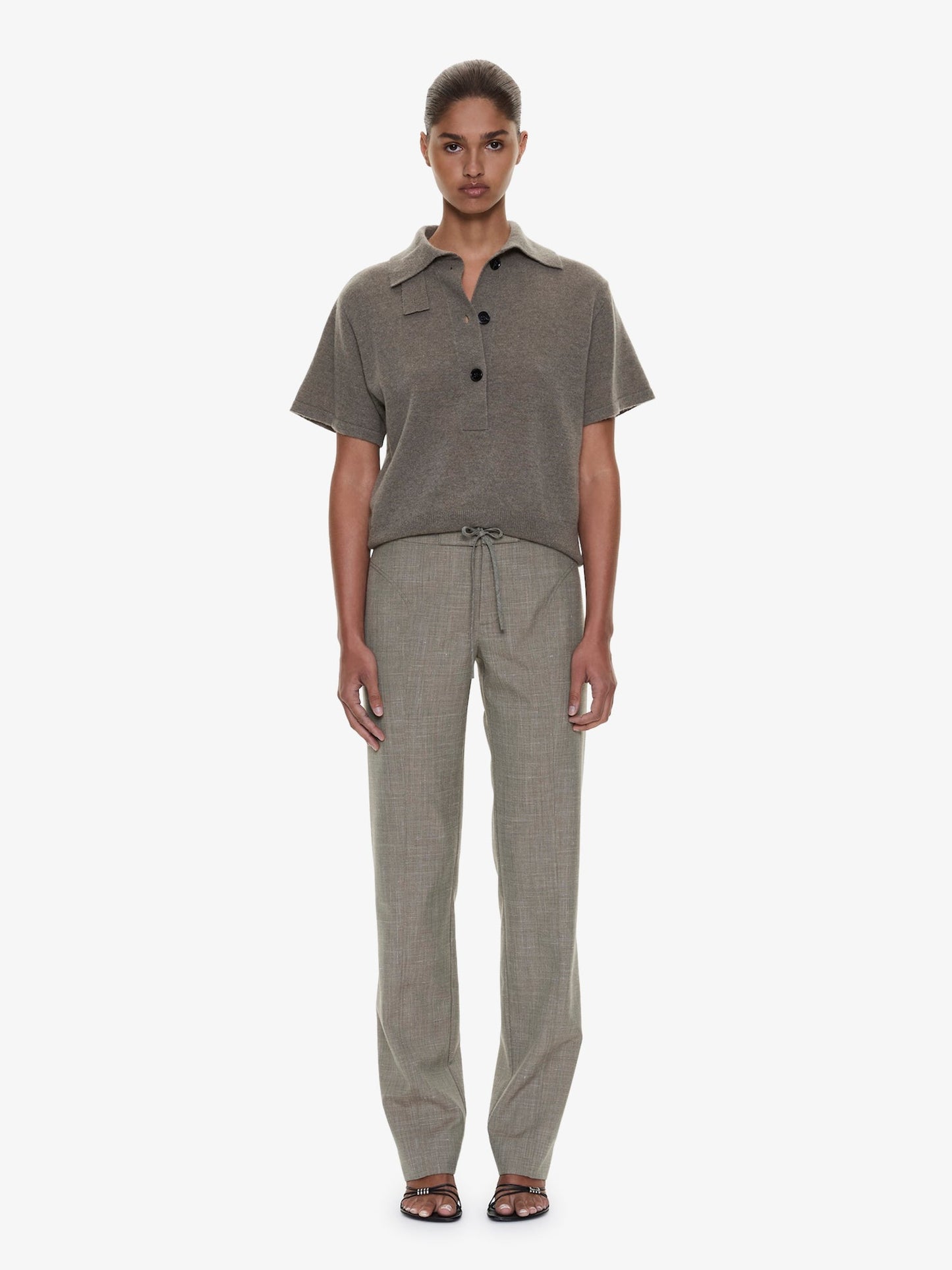 Image of a model wearing Pants. Product name - Banyan Panelled Tie Trouser in Marle colour by brand - CHRISTOPHER ESBER