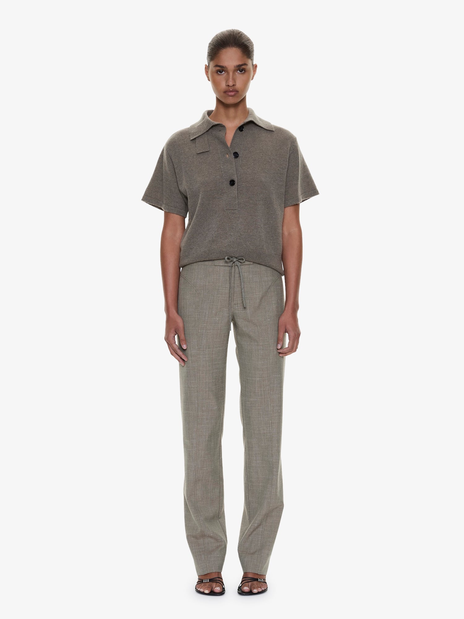 Image of a model wearing Pants. Product name - Banyan Panelled Tie Trouser in Marle colour by brand - CHRISTOPHER ESBER
