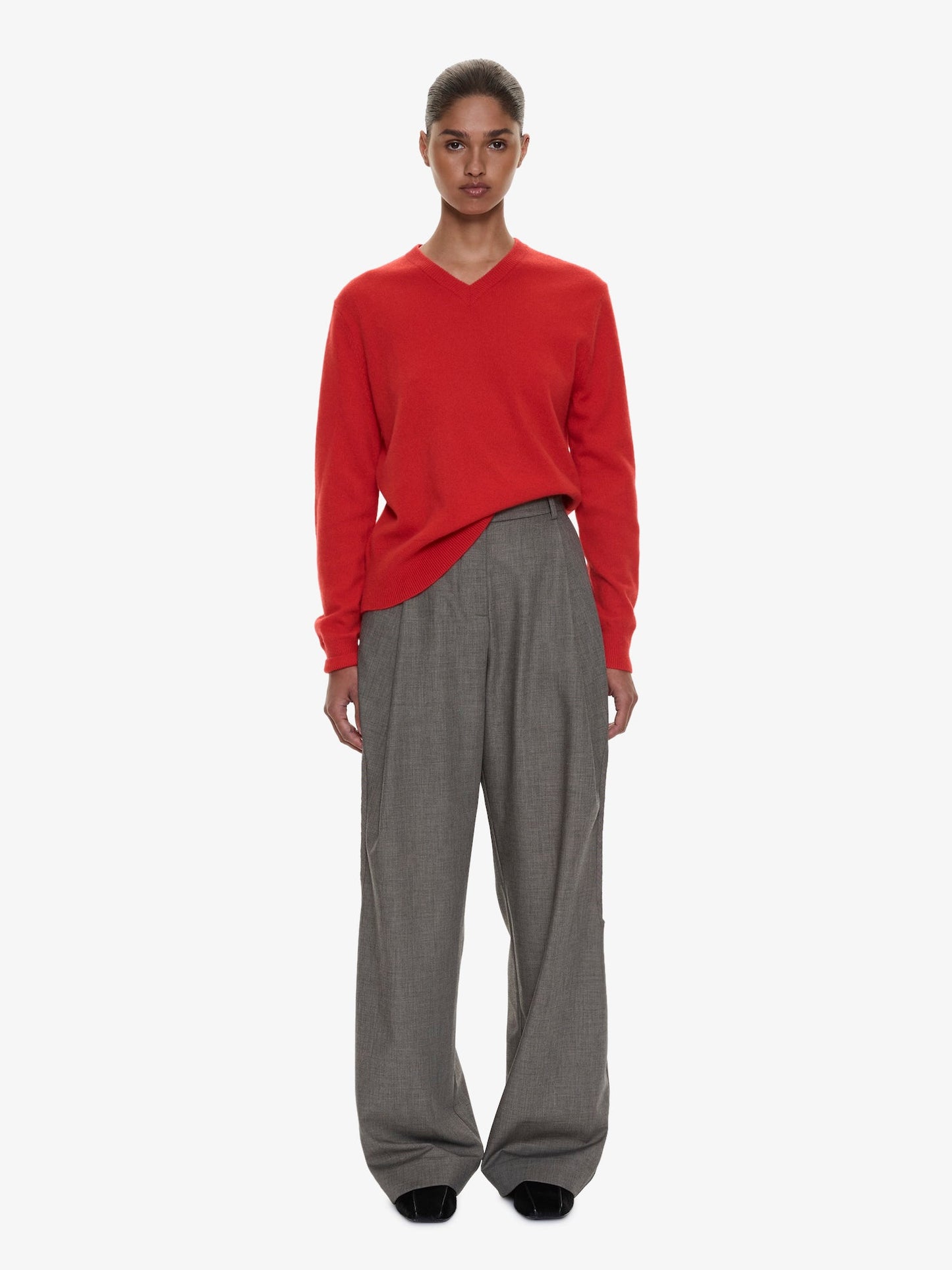 Image of a model wearing Pants. Product name - Sirocco Twill Trouser in Stone colour by brand - CHRISTOPHER ESBER