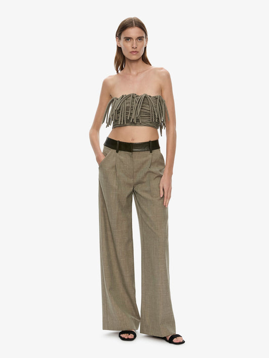 Image of a model wearing Pants. Product name - Tropical Wool Leather Waisted Trouser in Kombu colour by brand - CHRISTOPHER ESBER
