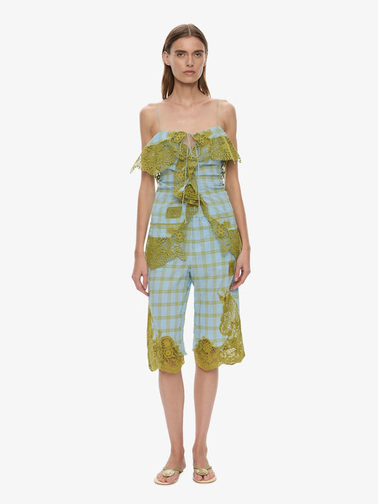 Image of a model wearing Shorts. Product name - Maya Embroidered Handkerchief Shorts in Check colour by brand - CHRISTOPHER ESBER