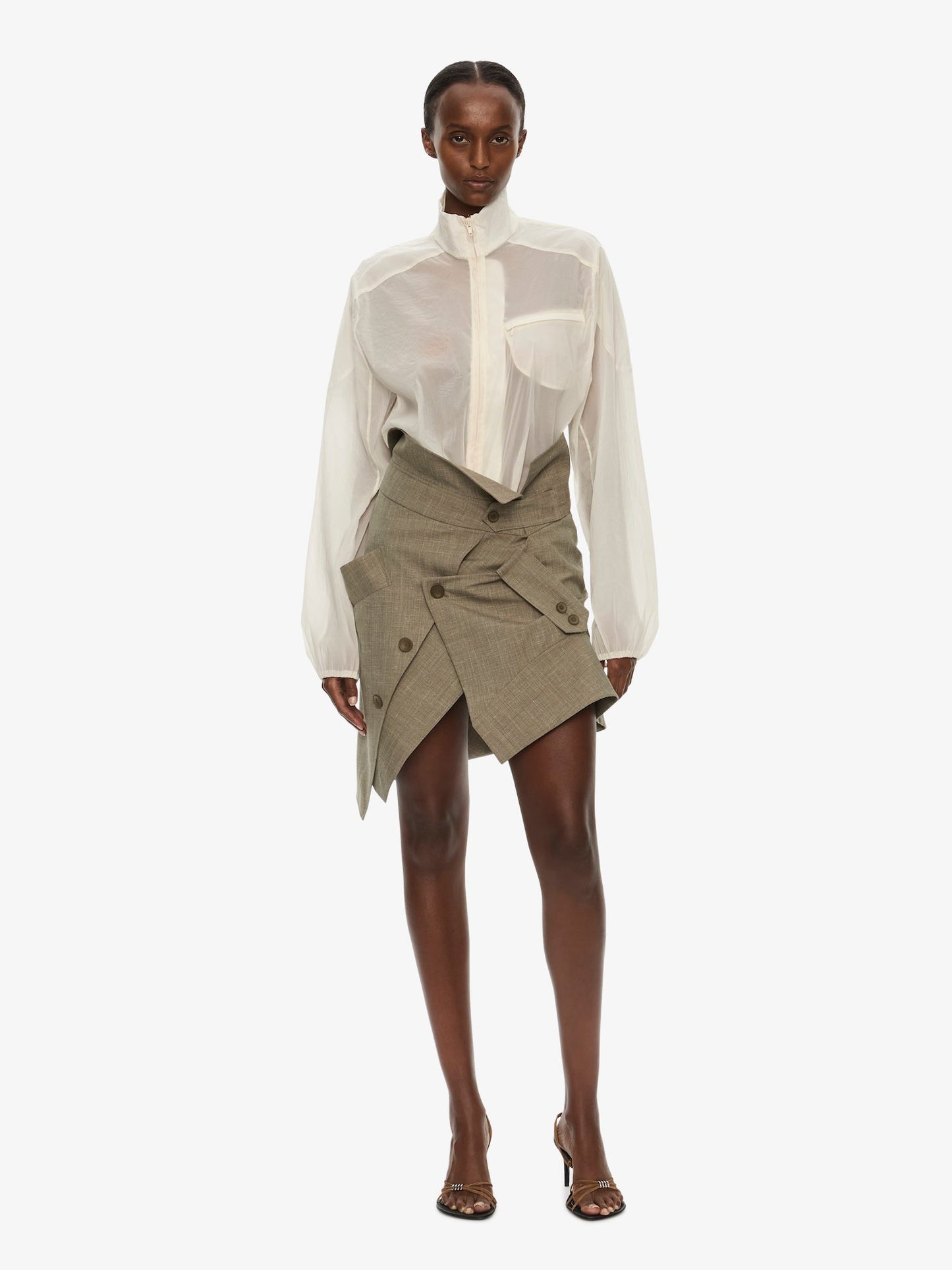 Image of a model wearing Outerwear. Product name - Dannie Lucent Mottled Sheer Bomber in White colour by brand - CHRISTOPHER ESBER