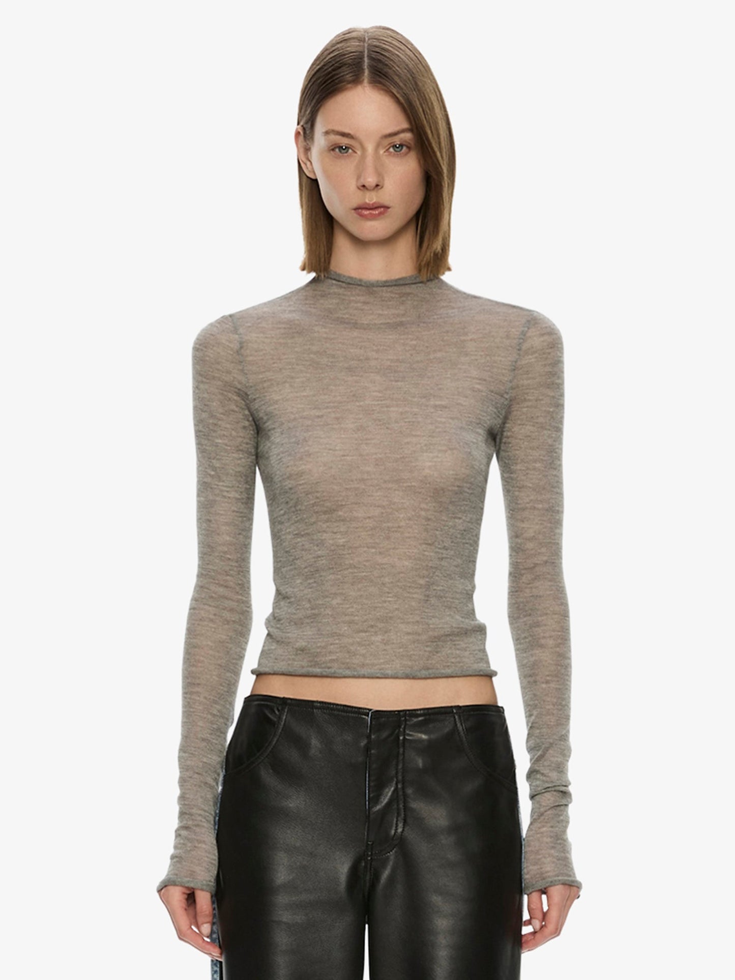 Image of a model wearing Tops. Product name - Lenny Cashmere Long Sleeve Knit Top in Marle colour by brand - CHRISTOPHER ESBER