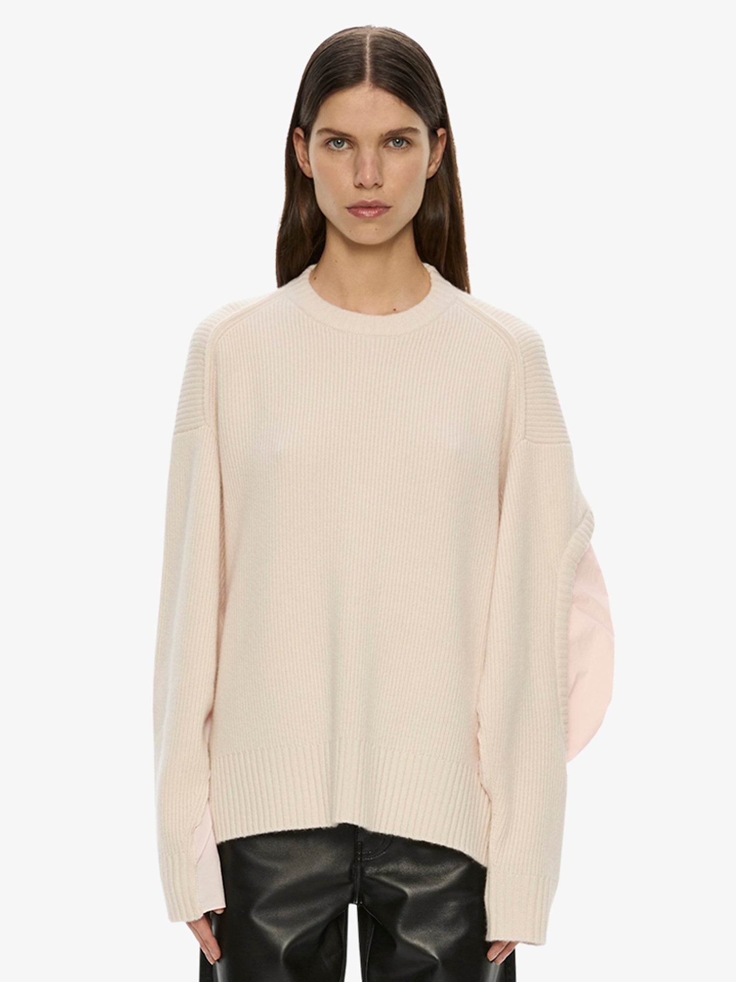 Image of a model wearing Tops. Product name - Airbag Sweater in Pink colour by brand - CHRISTOPHER ESBER