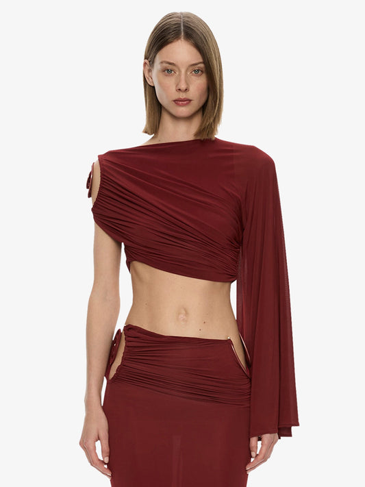 Image of a model wearing Tops. Product name - Aurelia Sculpted Spiral Drape Top in Wine colour by brand - CHRISTOPHER ESBER