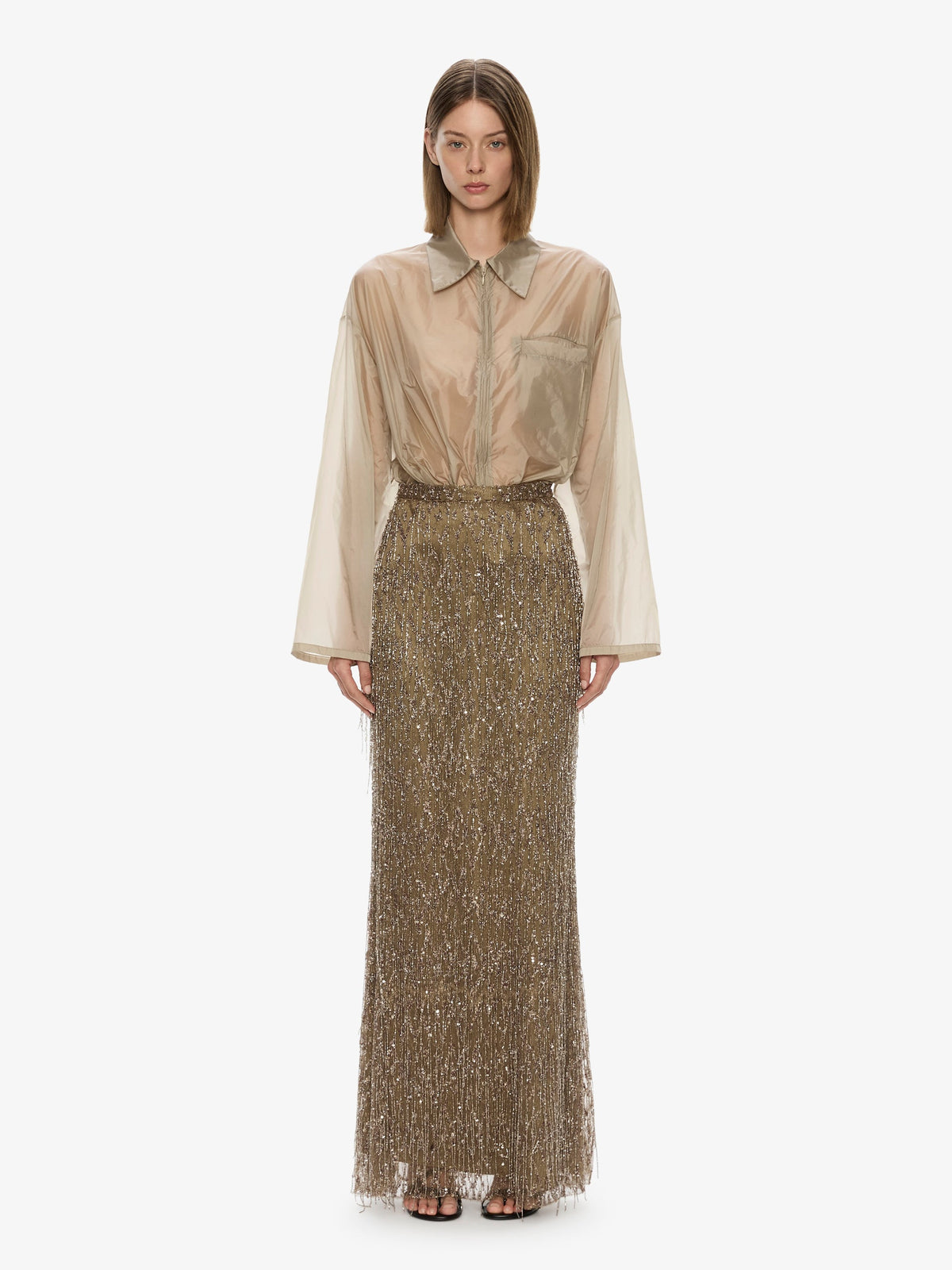 Image of a model wearing Skirts. Product name - Gilded Chevron Lace Skirt in Skirt colour by brand - CHRISTOPHER ESBER