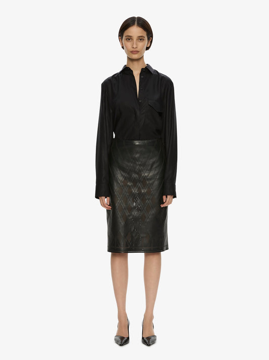 Image of a model wearing Skirts. Product name - Perforated Leather Skirt in Black colour by brand - CHRISTOPHER ESBER