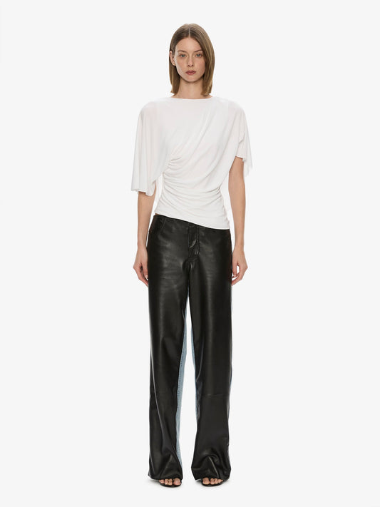 Image of a model wearing Pants. Product name - Troy Deconstruct Leather Jean in Black colour by brand - CHRISTOPHER ESBER