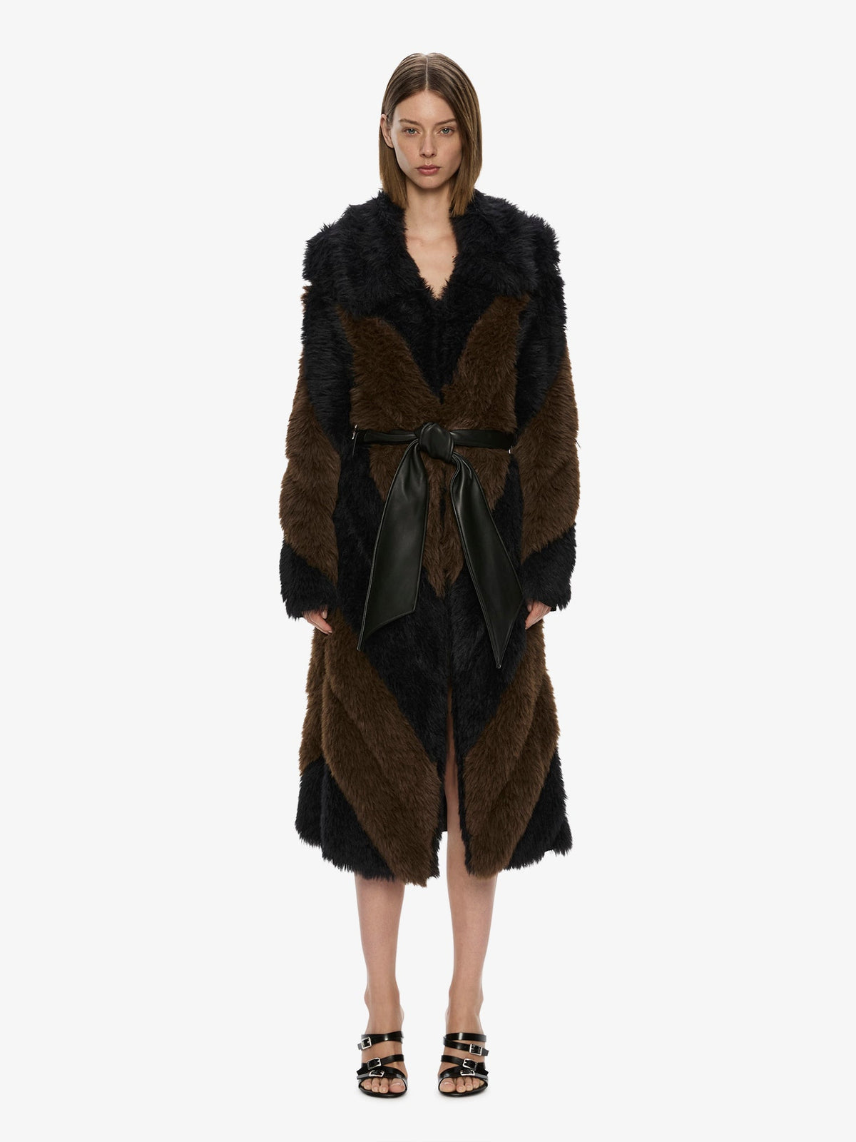 Image of a model wearing Outerwear. Product name - Nora Coat in Chocolate colour by brand - CHRISTOPHER ESBER