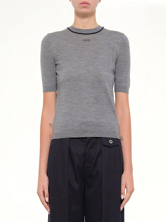 Image of a model wearing Outerwear. Product name - Short-Sleeve Sweater in Grey colour by brand - LOEWE