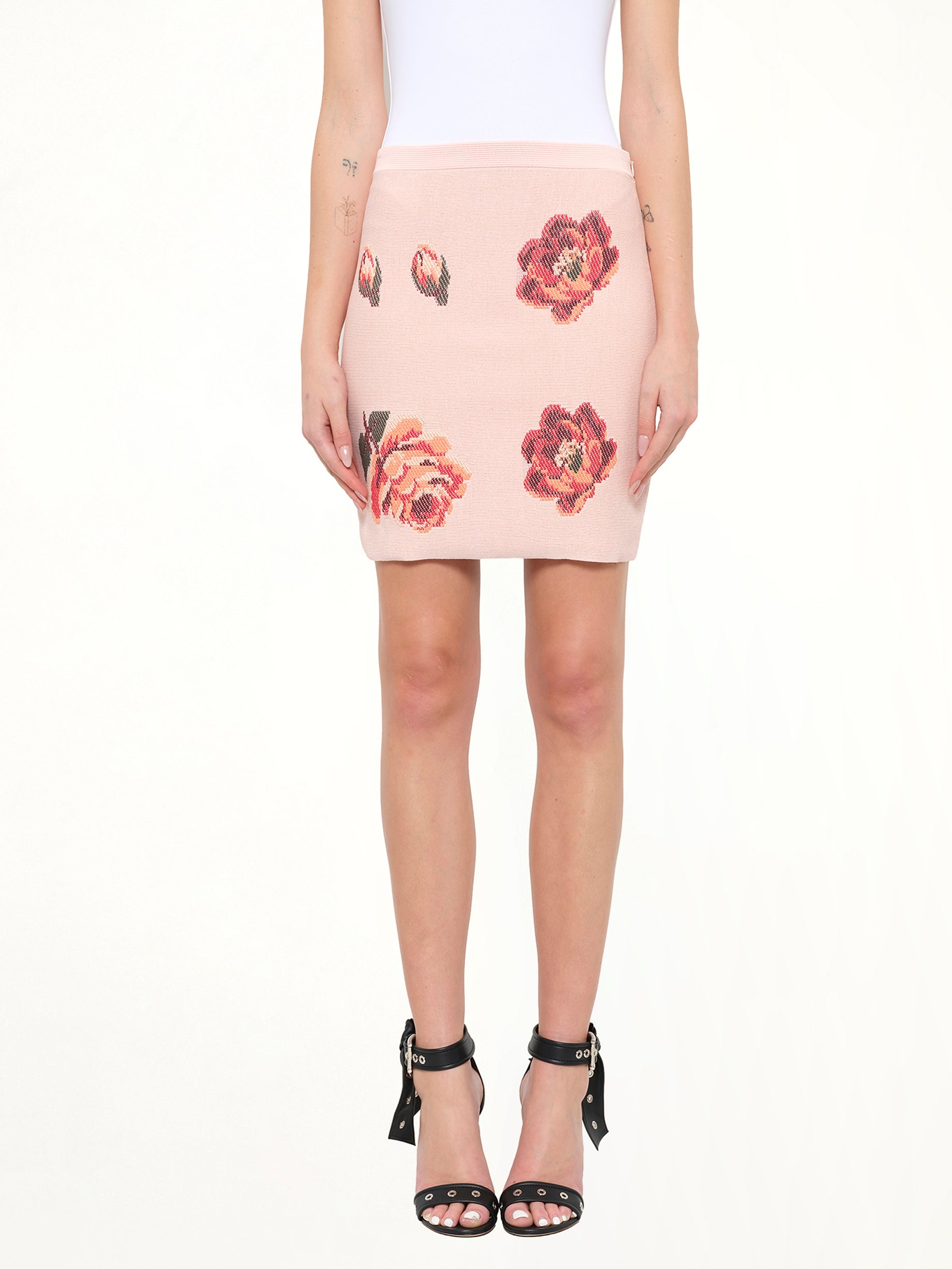 Image of a model wearing Skirts. Product name - Alexander McQueen Tapestry Jacquard Mini Skirt in Multicolour colour by brand - ALEXANDER MCQUEEN