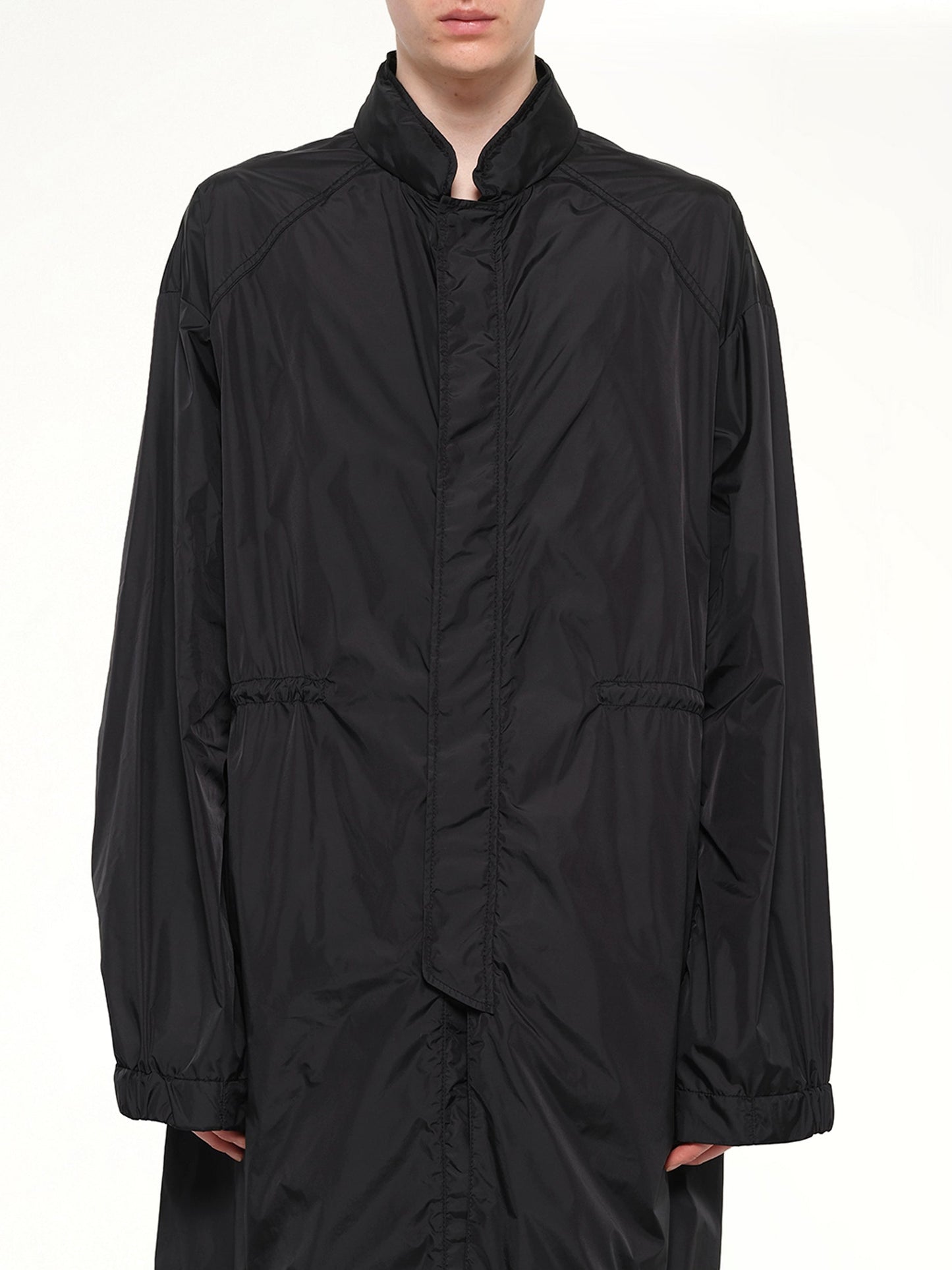 Image of a model wearing Outerwear. Product name - Juunj Parka in Black colour by brand - JUUNJ