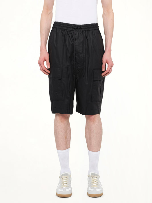Image of a model wearing Shorts. Product name - Juunj Short in Black colour by brand - JUUNJ