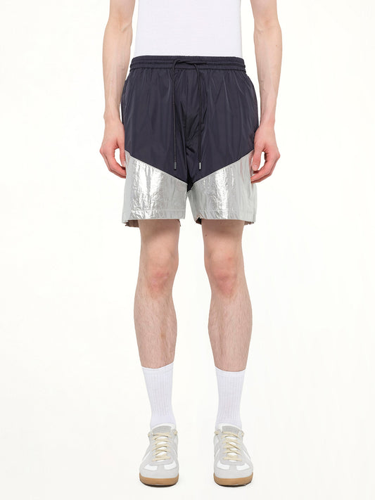 Image of a model wearing Shorts. Product name - Juunj Short in Navy colour by brand - JUUNJ