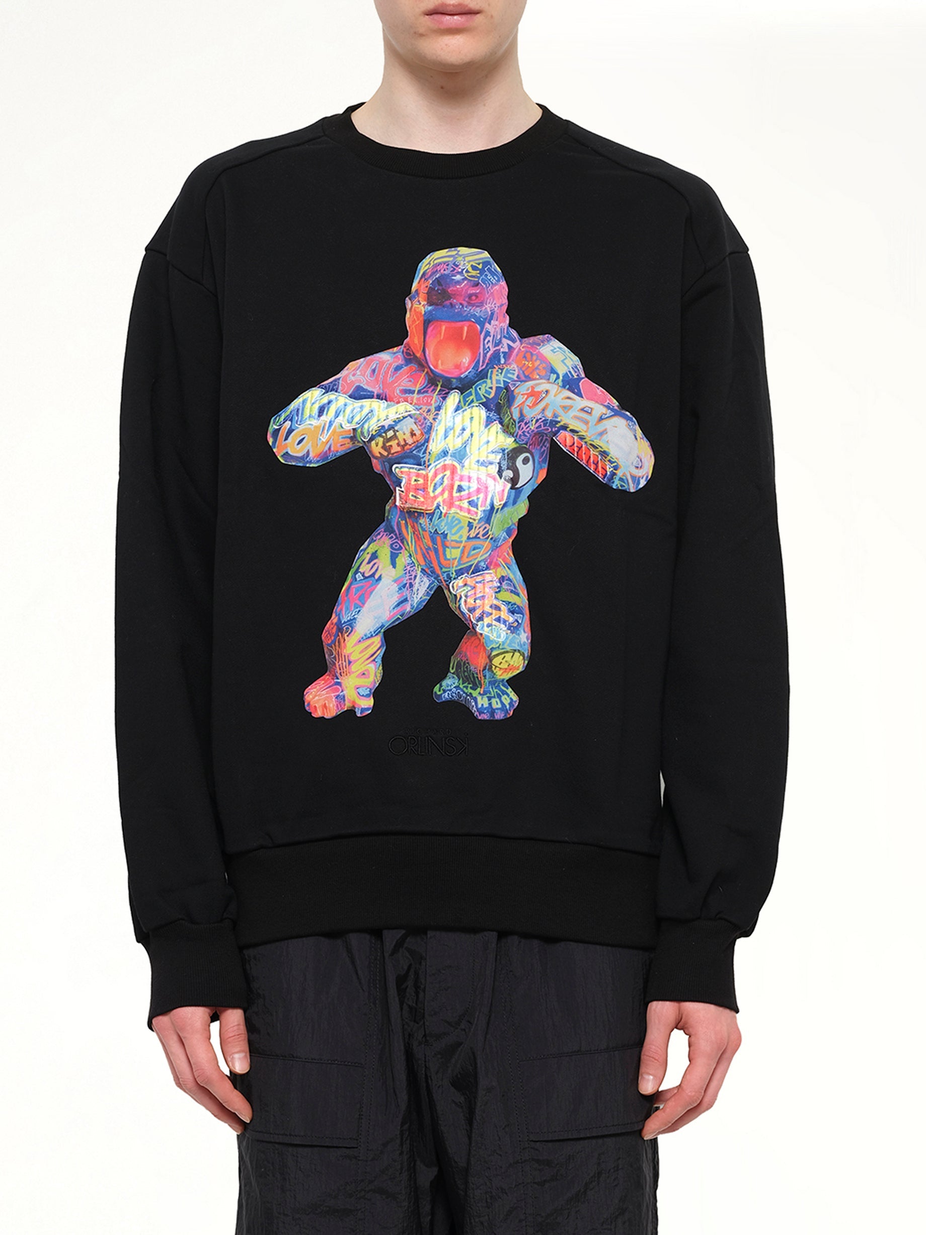 Image of a model wearing Outerwear. Product name - King Kong Sweatshirt in Black colour by brand - JUUNJ