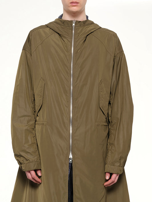 Image of a model wearing Outerwear. Product name - Parka in Khaki colour by brand - JUUNJ