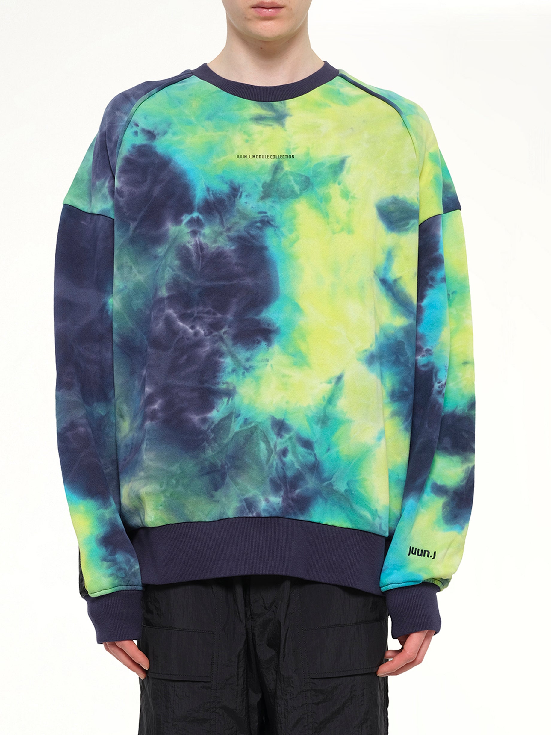Image of a model wearing Outerwear. Product name - Tie Dye Sweatshirt in Blue colour by brand - JUUNJ