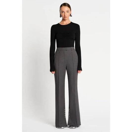Image of a model wearing Pants. Productname: Endzone Pant in Charcoal colour by brand - sass and bide