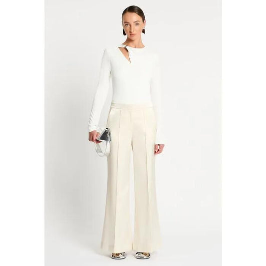 Image of a model wearing Tops. Productname: Rae Long Sleeve Top in Ivory colour by brand - sass and bide