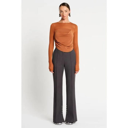 Image of a model wearing Tops. Productname: Baiyu Long Sleeve Top in Rust colour by brand - sass and bide