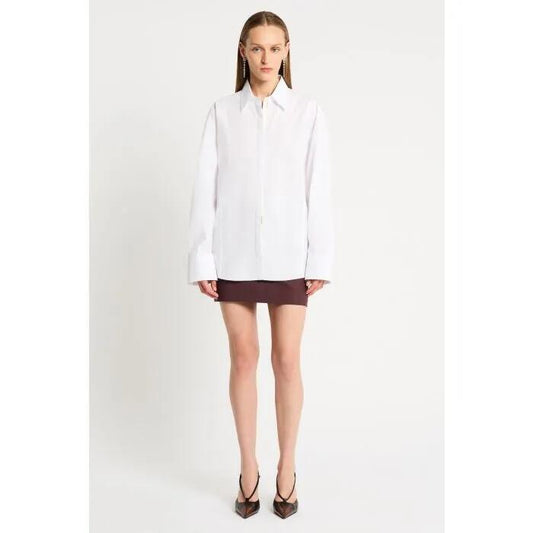 Image of a model wearing Tops. Productname: Inspiral Shirt in White colour by brand - sass and bide