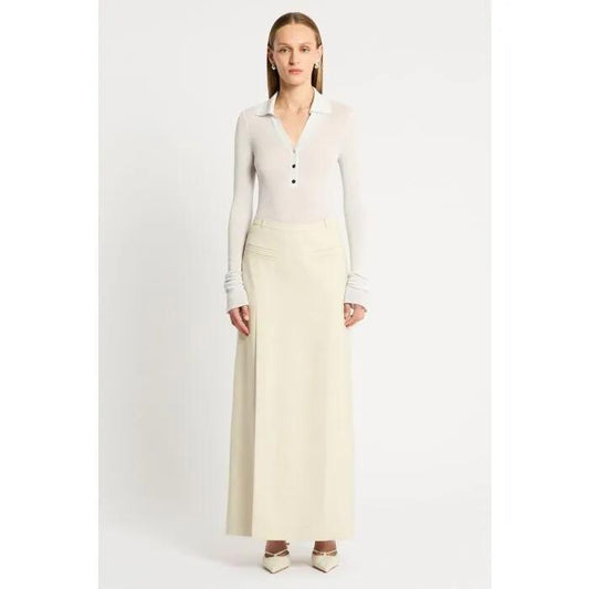 Image of a model wearing Tops. Productname: Lucid Knit Polo in Ivory colour by brand - sass and bide