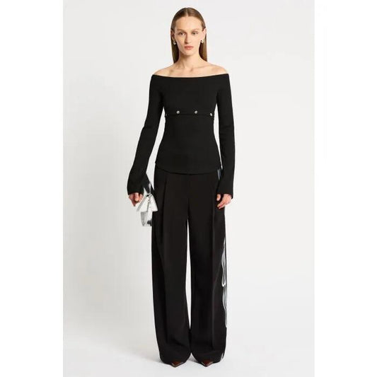 Image of a model wearing Tops. Productname: Studded Longsleeve Tee in Black colour by brand - sass and bide