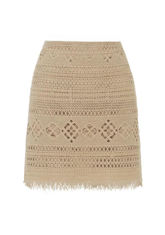 Image of a model wearing Skirts. Productname: Daniela Textured Mini Skirt in Almond colour by brand - MOS The Label