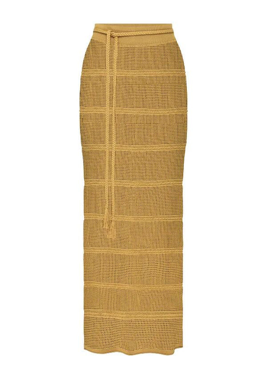 Image of a model wearing Skirts. Productname: Carmen Knit Midi Skirt in Mustard colour by brand - MOS The Label