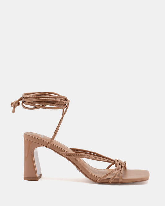 Image of Sandals. Product name - Urijah Women's Strappy Low Heel Sand Novo Sandals in Sand colour by brand - NOVO