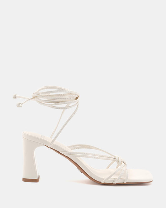 Image of Sandals. Product name - Urijah Women's Strappy Low Heel WHITE Novo Sandals in White colour by brand - NOVO