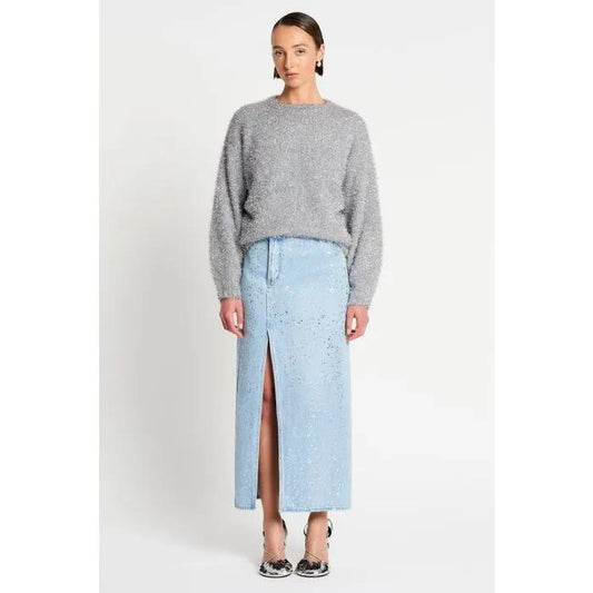 Image of a model wearing Denim. Productname: Wink Indigo Denim Skirt in Denim colour by brand - sass and bide