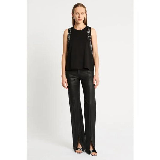 Image of a model wearing Tops. Productname: Soverign Tank in Black colour by brand - sass and bide