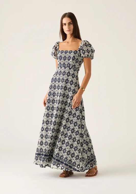 Image of a model wearing Dress. Productname: Pedra Embroidery Maxi Dress in Navy colour by brand - MOS The Label