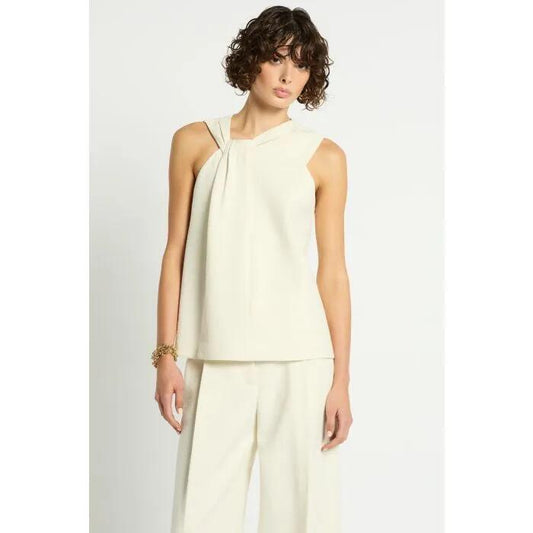 Image of a model wearing Tops. Productname: Odessa Top in Cream colour by brand - sass and bide