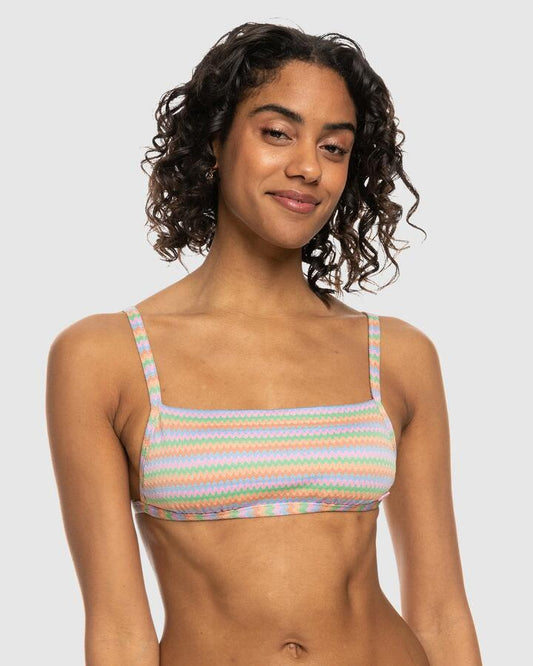 Image of a model wearing Tops. Productname: Roxy Womens Wavy Stripe Bralette Bikini Top Papaya Wavy Stripe S - in Papaya Wavy Stripe S colour by brand - Roxy