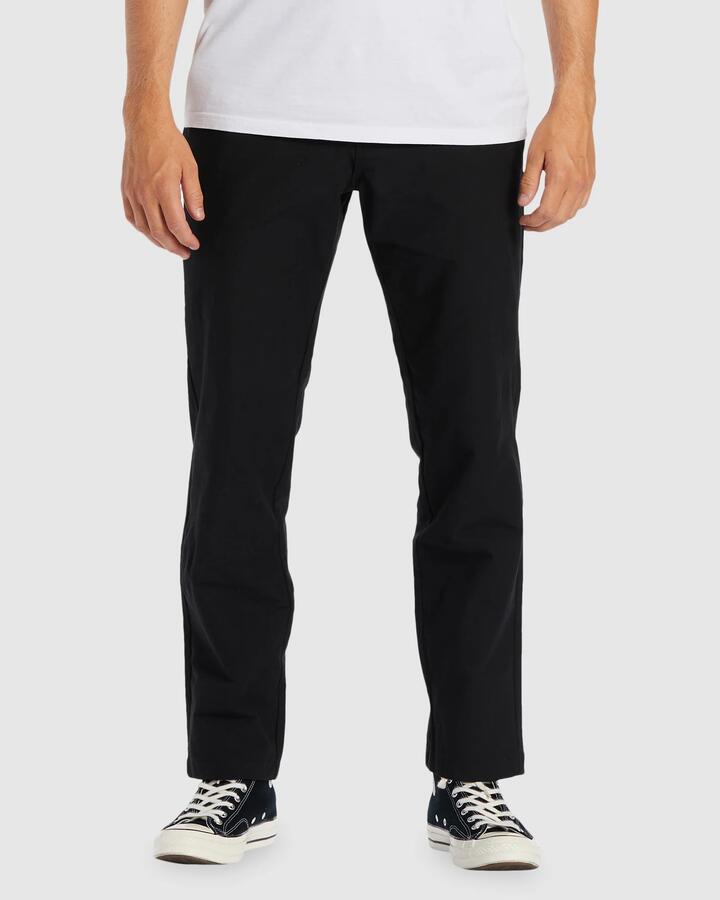 Image of a model wearing Pants. Productname: Billabong - Mens A/Div Surftrek Plus Organic Elastic Waist Pants - Black - in Black colour by brand - Billabong