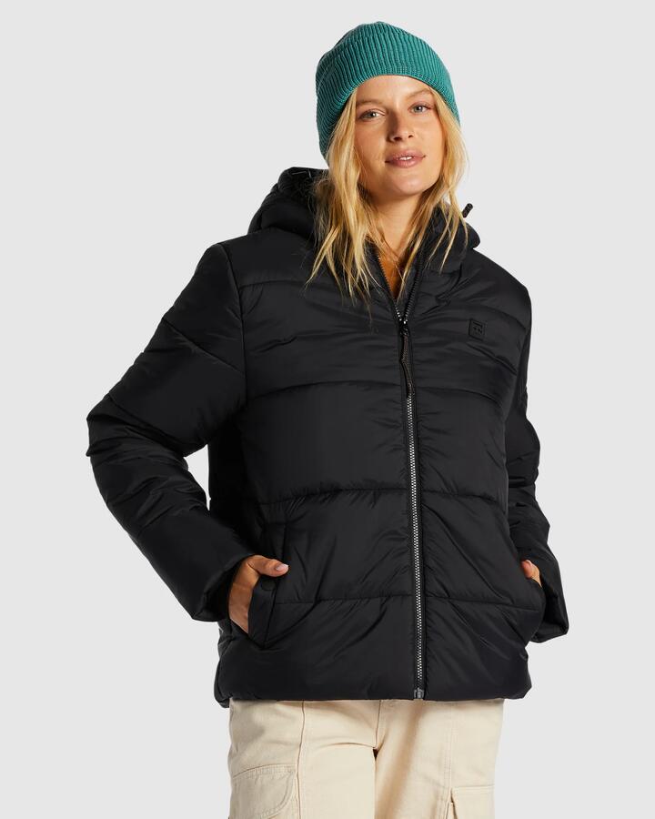 Image of a model wearing Outerwear. Product name - Billabong Womens Transport Puffer Jacket Black in Black colour by brand - Billabong