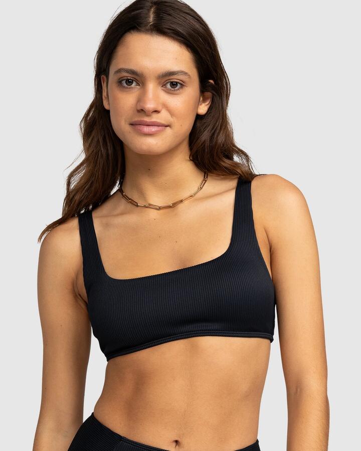 Image of a model wearing Tops. Product name - Roxy Womens Roxy Love Bralette Bikini Top Anthracite in Anthracite colour by brand - Roxy
