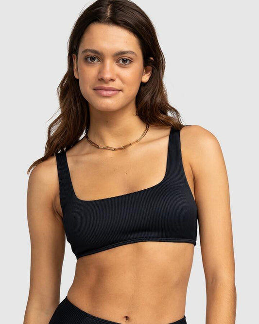 Image of a model wearing Tops. Product name - Roxy Womens Roxy Love Bralette Bikini Top Anthracite in Anthracite colour by brand - Roxy