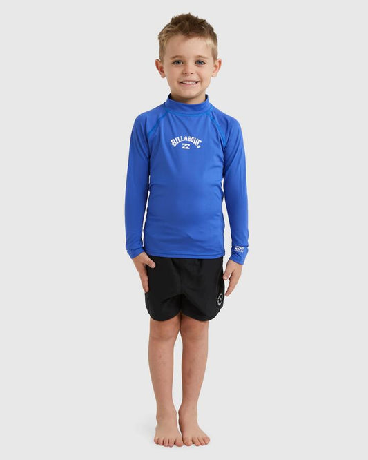 Image of a model wearing Tops. Product name - Billabong Boys 0-7 All Day Long Sleeve Rash Vest Cobalt in Cobalt colour by brand - Billabong