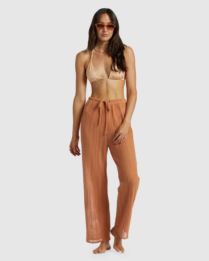Image of a model wearing Pants. Product name - Billabong Womens Largo Beach Pants Toffee in Toffee colour by brand - Billabong